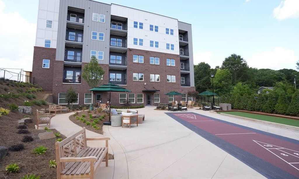 Outdoor courtyard and apartment building at Park Place by Highlands