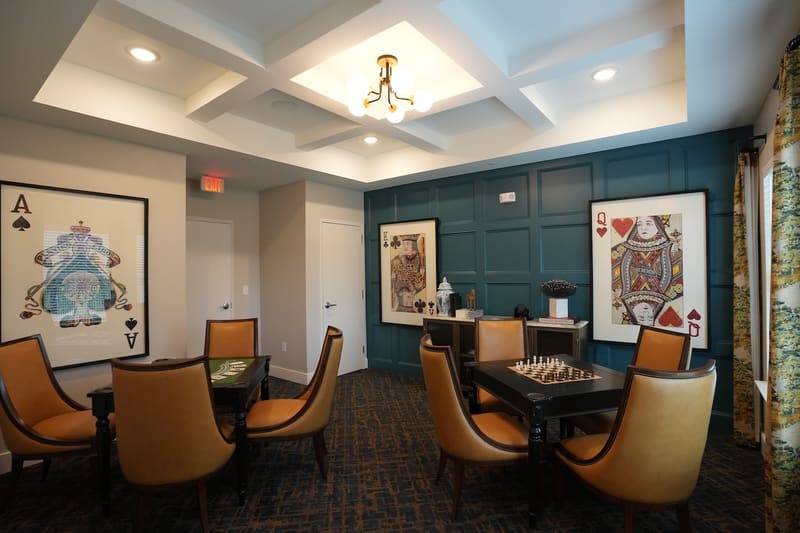 Game room with card and chess tables